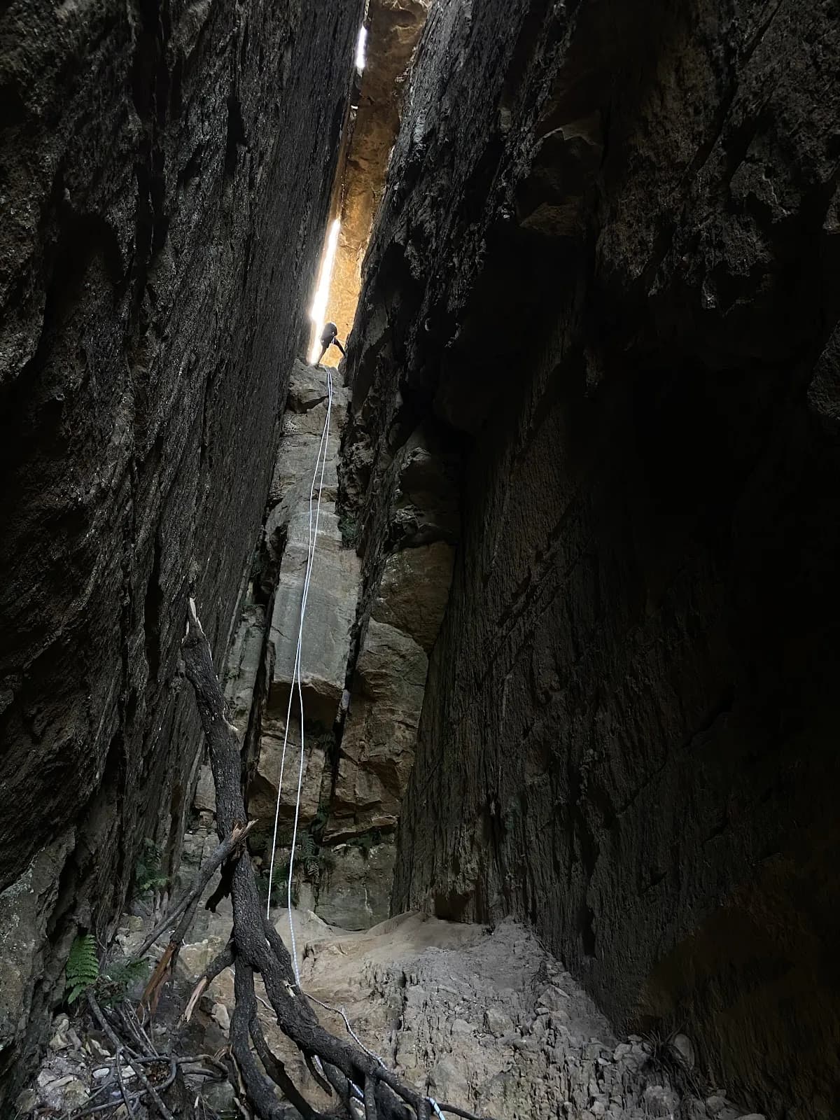 Exiting the fissure onto the exposed cliff face