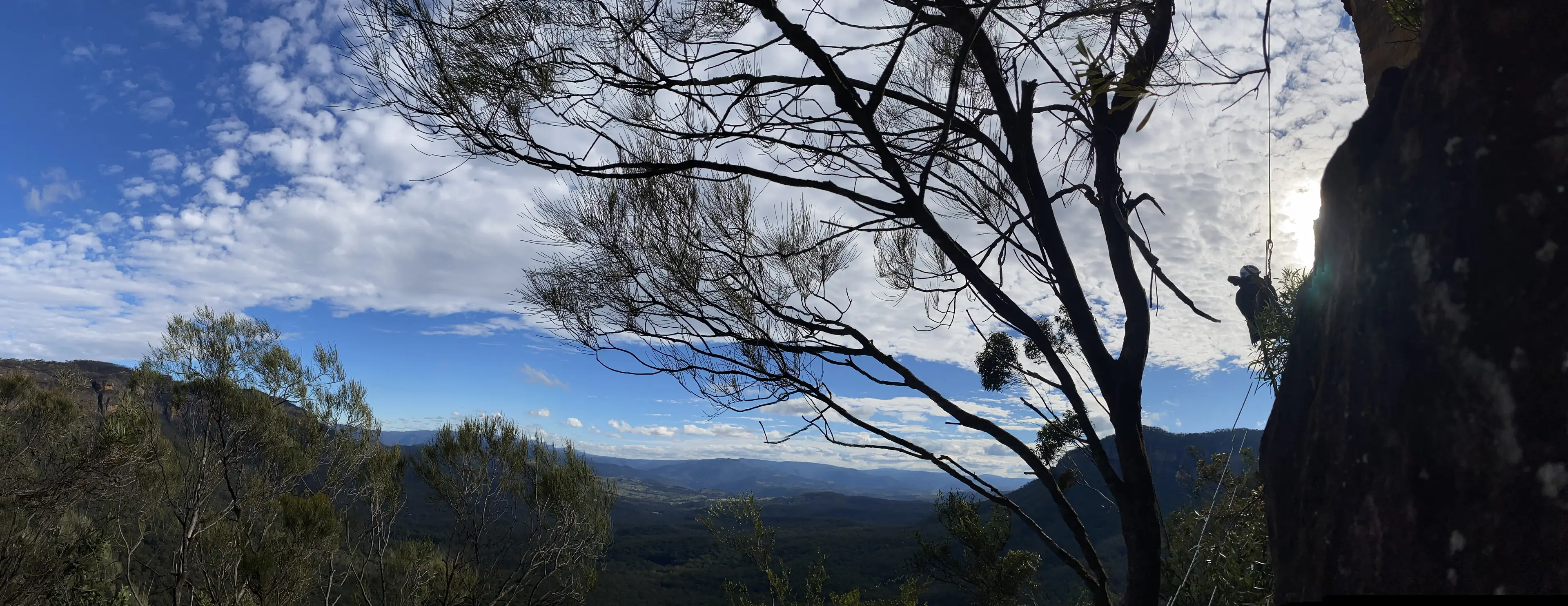 Abseiling at Boars Head with scenic Blue Mountains views